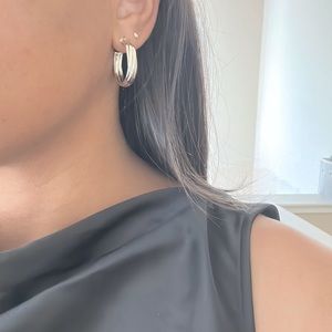 Tiffany & Co. Silver Hoop Earrings as seen on Hailey Beiber